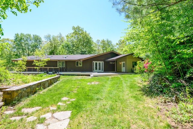97 W Rd, Marlborough, CT 06447 - back of property featuring a lawn, a sunroom, and french doors