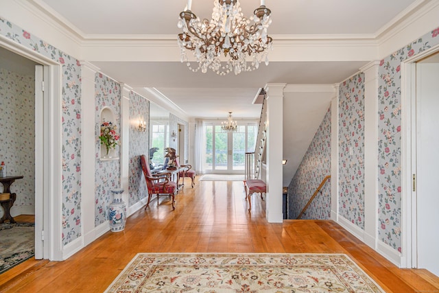 49 Great Ring Rd, Newtown, CT 06482 - entryway featuring a chandelier, hardwood / wood-style flooring, wallpapered walls, and ornamental molding