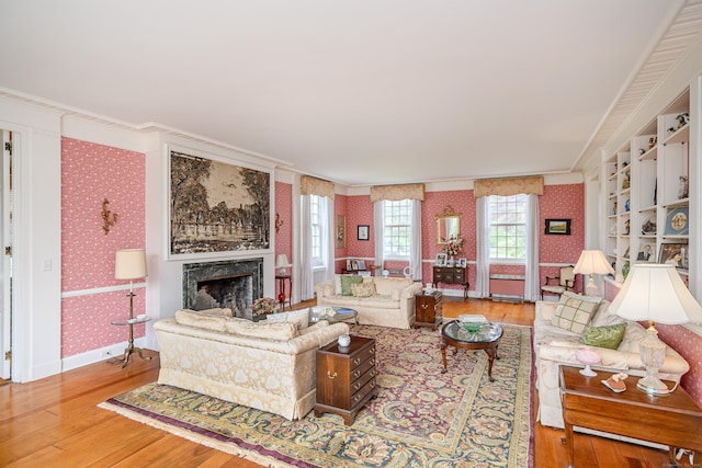 49 Great Ring Rd, Newtown, CT 06482 - living room featuring wallpapered walls, ornamental molding, wood finished floors, and a premium fireplace