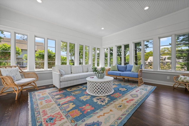 sunroom / solarium featuring baseboards, recessed lighting, hardwood / wood-style flooring, and crown molding