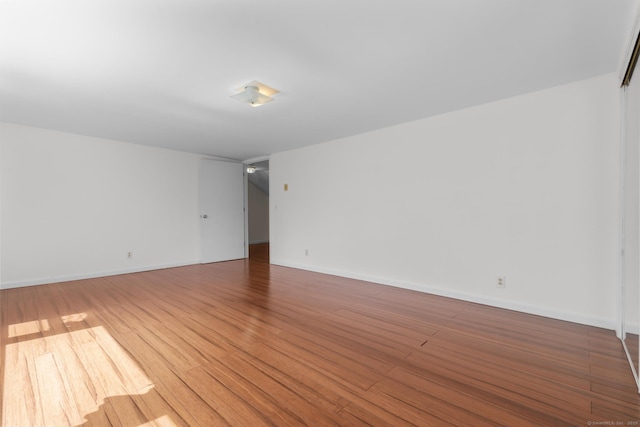 130 Fitch St, North Haven, CT 06473 - spare room featuring wood finished floors and baseboards