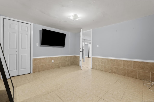 130 Fitch St, North Haven, CT 06473 - tiled spare room with wainscoting