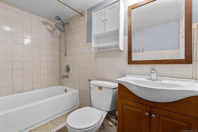 130 Fitch St, North Haven, CT 06473 - bathroom with tile walls, toilet, vanity, shower / washtub combination, and tile patterned flooring
