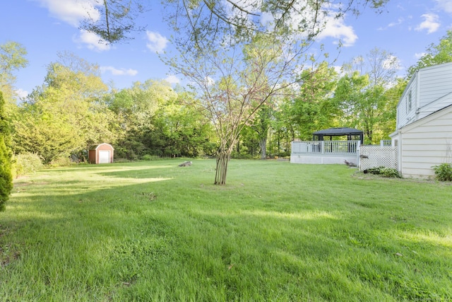130 Fitch St, North Haven, CT 06473 - view of grassy yard with a gazebo, a storage shed, and an outbuilding