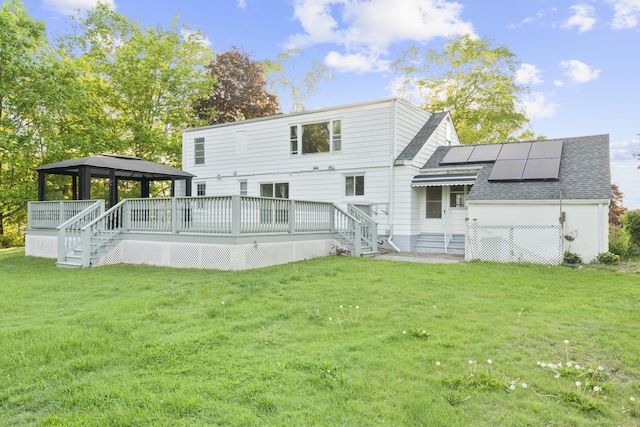 130 Fitch St, North Haven, CT 06473 - rear view of property featuring a gazebo, a shingled roof, and a lawn