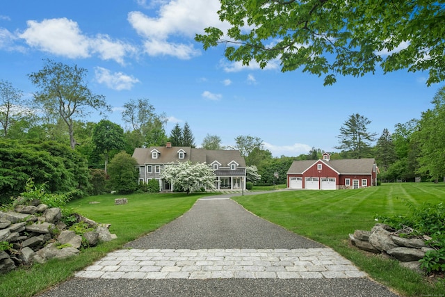 135 Limekiln Rd, Redding, CT 06896 - cape cod house featuring a front yard, driveway, an outdoor structure, and a garage