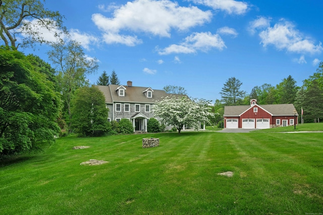 135 Limekiln Rd, Redding, CT 06896 - view of green lawn featuring an outbuilding and driveway