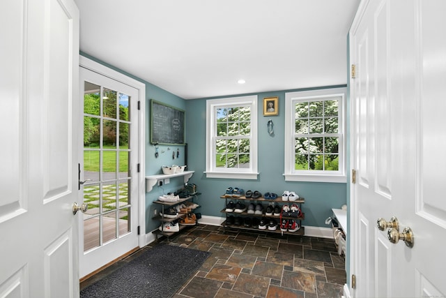 135 Limekiln Rd, Redding, CT 06896 - doorway to outside with baseboards, dark stone finish floors, and recessed lighting