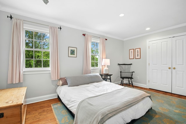135 Limekiln Rd, Redding, CT 06896 - bedroom with baseboards, crown molding, wood finished floors, a closet, and recessed lighting