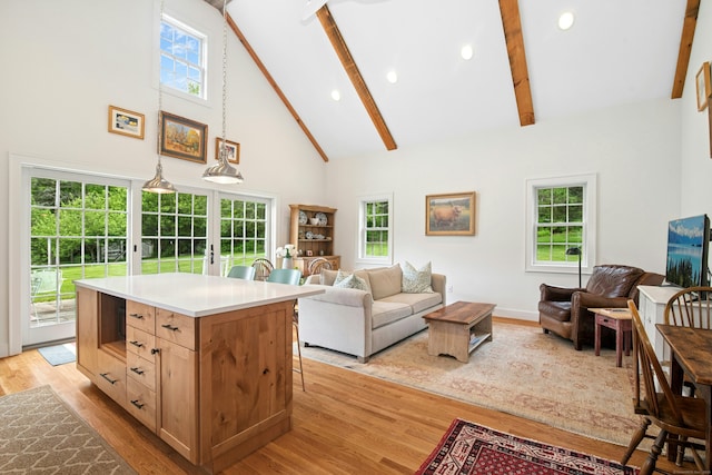 135 Limekiln Rd, Redding, CT 06896 - kitchen featuring high vaulted ceiling, open floor plan, light wood-style floors, beamed ceiling, and light countertops