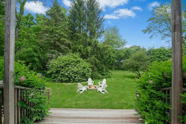 135 Limekiln Rd, Redding, CT 06896 - view of green lawn featuring a fire pit and a deck