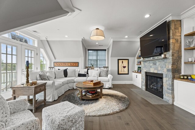 66 High St Unit 40, Guilford, CT 06437 - living area featuring ornamental molding, a fireplace, recessed lighting, wood finished floors, and built in features