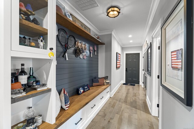 66 High St Unit 40, Guilford, CT 06437 - mudroom featuring ornamental molding, light wood finished floors, and baseboards