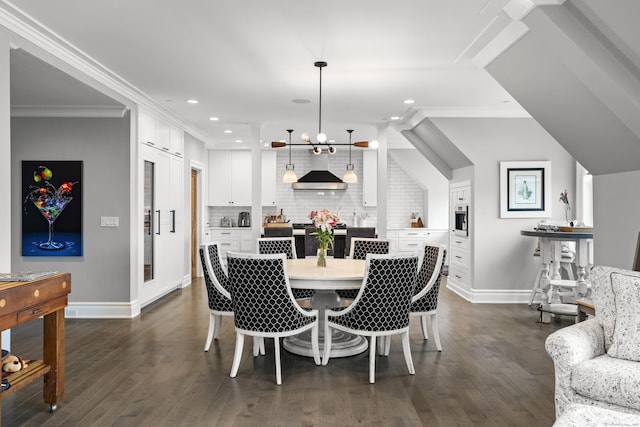 66 High St Unit 40, Guilford, CT 06437 - dining space with baseboards, a chandelier, recessed lighting, ornamental molding, and dark wood-type flooring