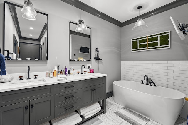 66 High St Unit 40, Guilford, CT 06437 - full bathroom with double vanity, a soaking tub, and ornamental molding