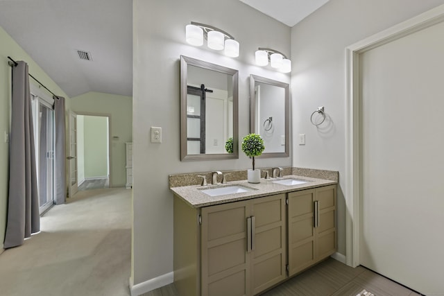 114 Mountain View Rd, Glastonbury, CT 06033 - bathroom with double vanity, lofted ceiling, and baseboards