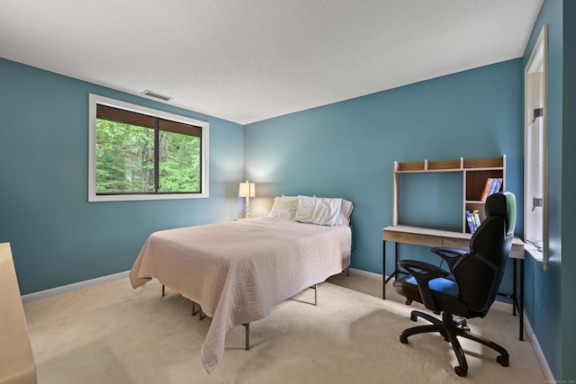 114 Mountain View Rd, Glastonbury, CT 06033 - carpeted bedroom with baseboards, an office area, and a textured ceiling