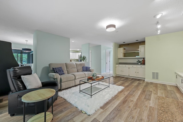 114 Mountain View Rd, Glastonbury, CT 06033 - living area featuring light wood finished floors and baseboards