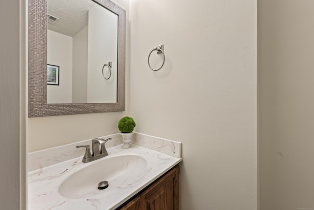 114 Mountain View Rd, Glastonbury, CT 06033 - bathroom with vanity and a textured ceiling