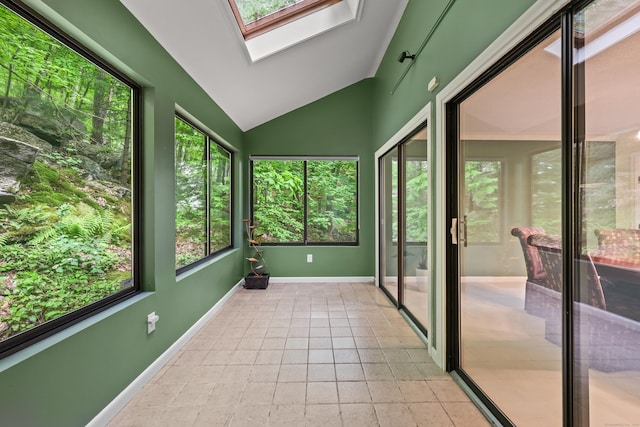 114 Mountain View Rd, Glastonbury, CT 06033 - unfurnished sunroom with vaulted ceiling, baseboards, a skylight, and tile patterned floors