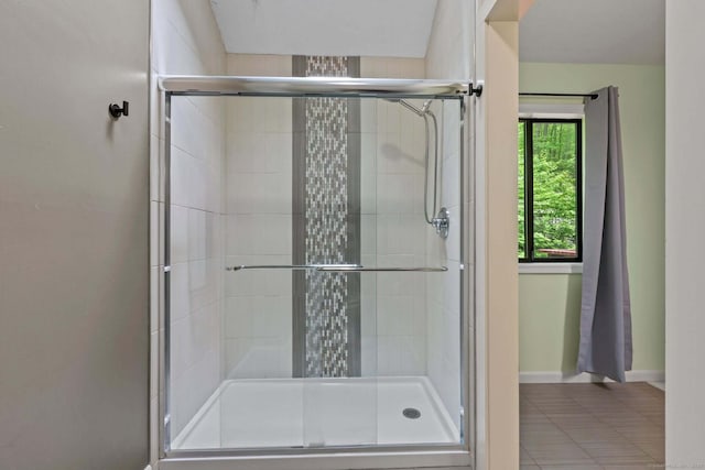 114 Mountain View Rd, Glastonbury, CT 06033 - bathroom featuring a stall shower, baseboards, and tile patterned flooring