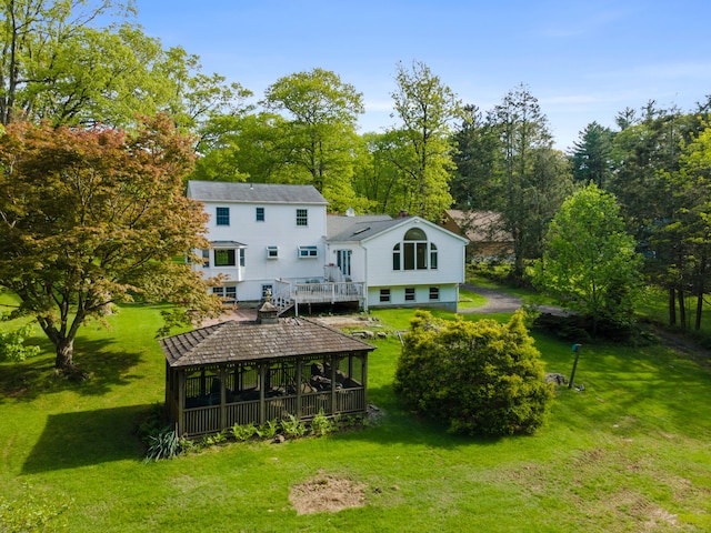 10 Rockwood Ln, Danbury, CT 06811 - back of property featuring a yard, a wooden deck, a gazebo, and view of scattered trees