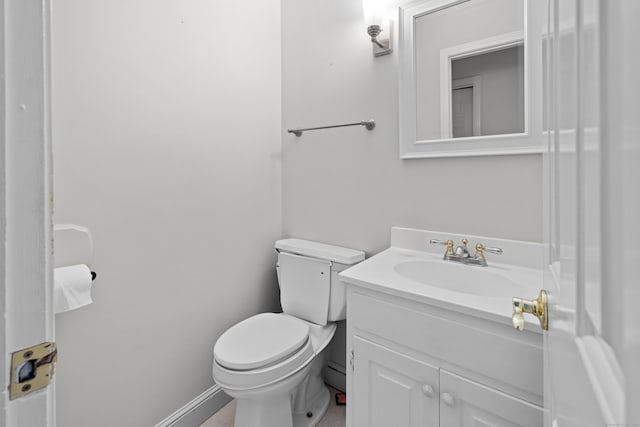 10 Rockwood Ln, Danbury, CT 06811 - half bath featuring toilet, vanity, and a baseboard heating unit
