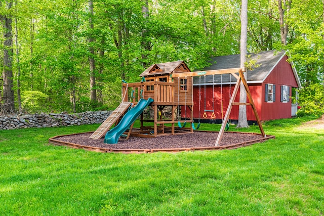 view of jungle gym featuring a lawn