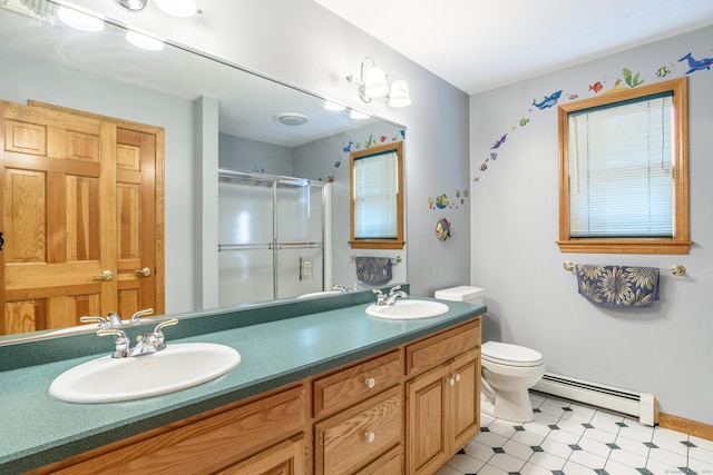 full bath featuring a baseboard heating unit, a shower stall, toilet, double vanity, and baseboards