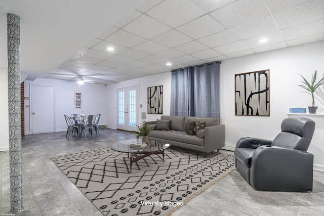 43 Roaring Brook Ln, Shelton, CT 06484 - living area featuring french doors, a paneled ceiling, recessed lighting, ceiling fan, and baseboards
