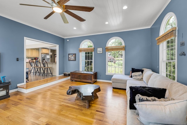 10 Harvard Ter, Norwich, CT 06360 - living area with light wood-style flooring, ceiling fan, crown molding, plenty of natural light, and recessed lighting
