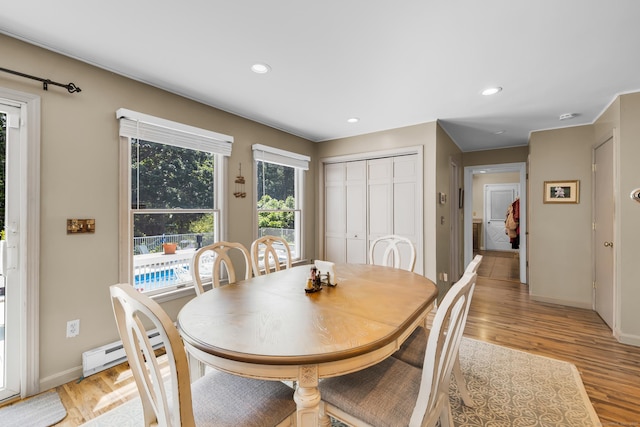 10 Harvard Ter, Norwich, CT 06360 - dining room with light wood-type flooring, a baseboard heating unit, and recessed lighting