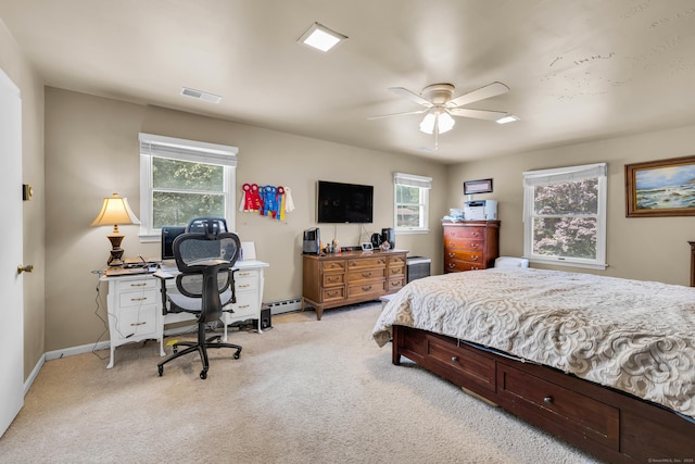 10 Harvard Ter, Norwich, CT 06360 - bedroom with light carpet, a desk, ceiling fan, and baseboard heating