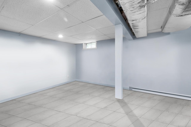 10 Harvard Ter, Norwich, CT 06360 - below grade area featuring baseboard heating and a drop ceiling