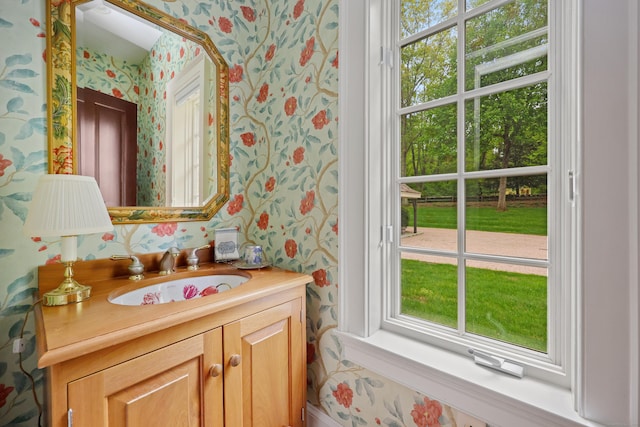 70 Sill Ln, Old Lyme, CT 06371 - bathroom with wallpapered walls, plenty of natural light, and vanity
