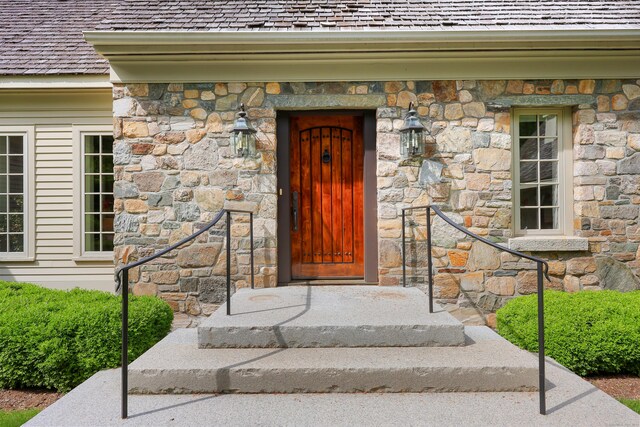 70 Sill Ln, Old Lyme, CT 06371 - doorway to property with stone siding