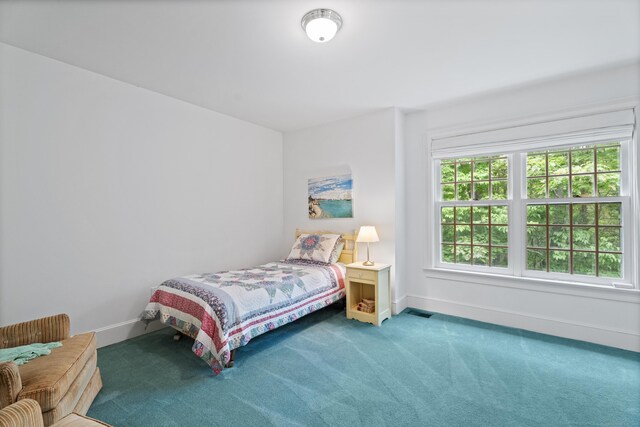 262 Fairview Rd, Westbrook, CT 06498 - carpeted bedroom featuring baseboards