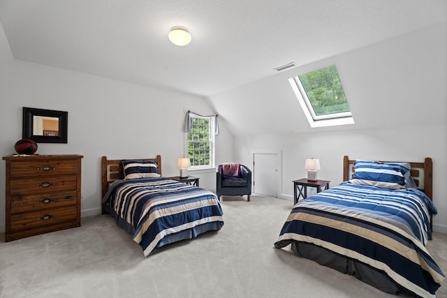 262 Fairview Rd, Westbrook, CT 06498 - bedroom with carpet flooring, lofted ceiling, a skylight, and baseboards