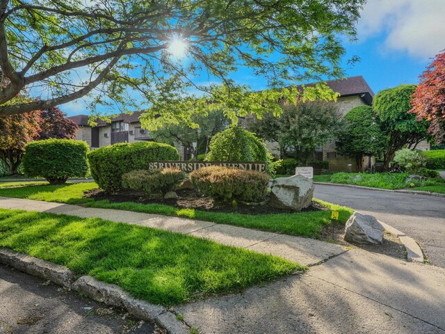 view of property hidden behind natural elements