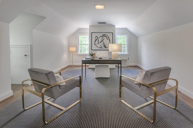 379 Hurlbutt St, Wilton, CT 06897 - office area with radiator, baseboards, wood finished floors, and vaulted ceiling