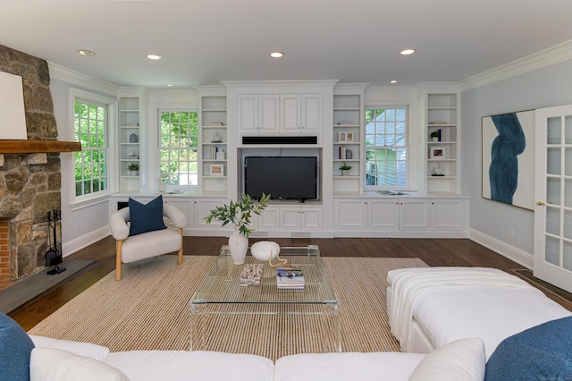 379 Hurlbutt St, Wilton, CT 06897 - living area featuring ornamental molding, dark wood finished floors, a fireplace, plenty of natural light, and recessed lighting