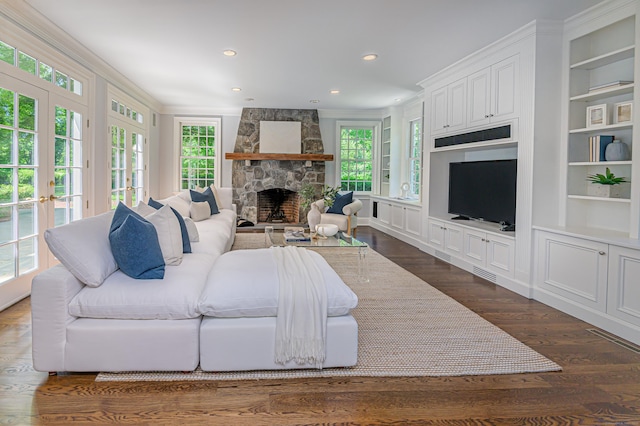 379 Hurlbutt St, Wilton, CT 06897 - living room featuring a fireplace, dark wood-style floors, ornamental molding, recessed lighting, and built in features