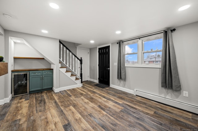 20 Rosengarten Dr, Waterbury, CT 06704 - entrance foyer featuring baseboard heating, beverage cooler, dark wood-style flooring, recessed lighting, and stairway
