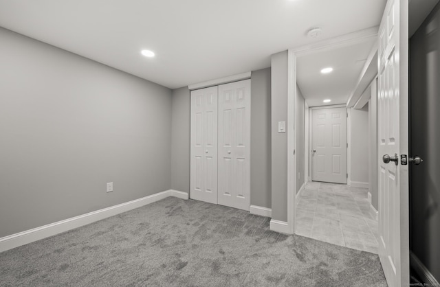 20 Rosengarten Dr, Waterbury, CT 06704 - unfurnished bedroom with light colored carpet, baseboards, recessed lighting, and a closet
