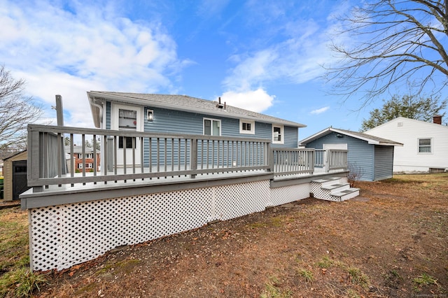 20 Rosengarten Dr, Waterbury, CT 06704 - rear view of property featuring an outdoor structure, a deck, and a storage unit