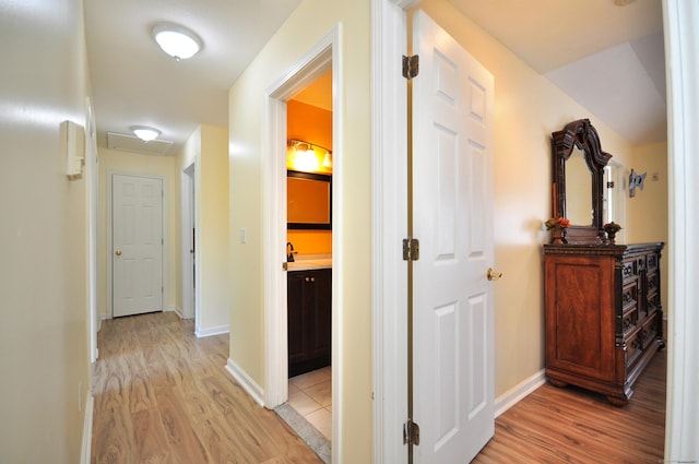 20 Nessa Way, Rocky Hill, CT 06067 - hallway with light wood-style flooring, baseboards, and attic access