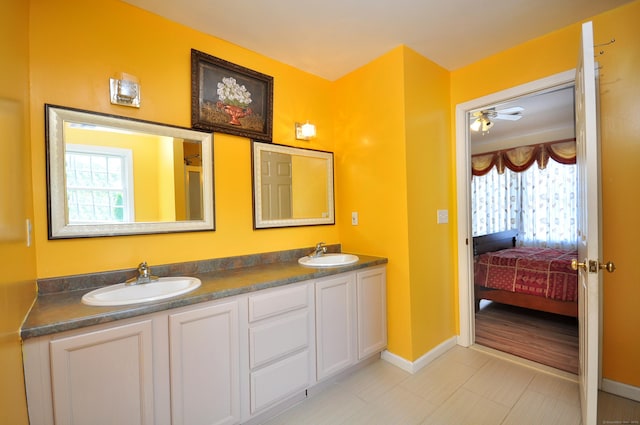 20 Nessa Way, Rocky Hill, CT 06067 - ensuite bathroom featuring plenty of natural light, double vanity, and baseboards