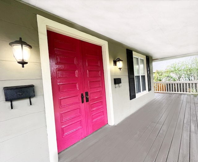 entrance to property with covered porch