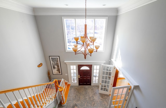 14 Dillman Ct, Ridgefield, CT 06877 - foyer featuring a chandelier, crown molding, and stairway