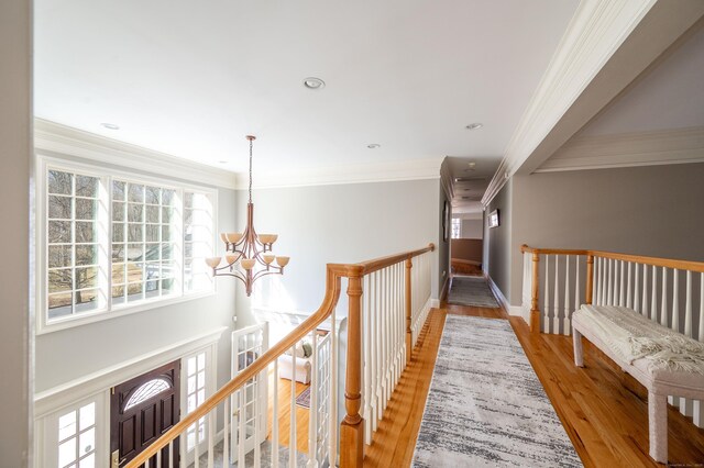 14 Dillman Ct, Ridgefield, CT 06877 - corridor with a chandelier, an upstairs landing, wood finished floors, recessed lighting, and ornamental molding
